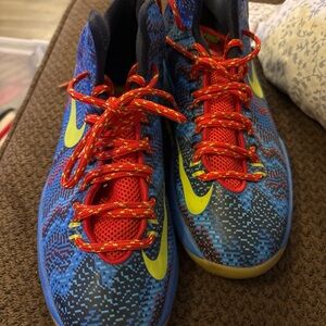 Nike Kids Blue and Red Sneakers with Yellow Accents